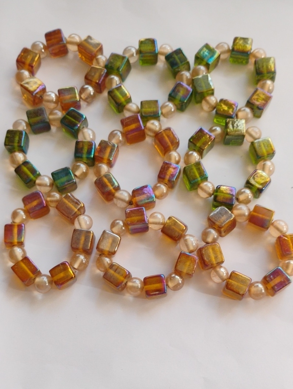 Irregular Glass Cube & Pearl Napkin Rings- Iridescent Amber and Green. Set Of 9